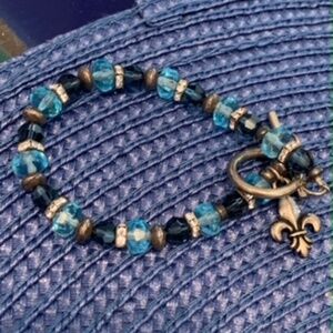 Blue Glass Bead Bracelet with Fleur de Lis Charm